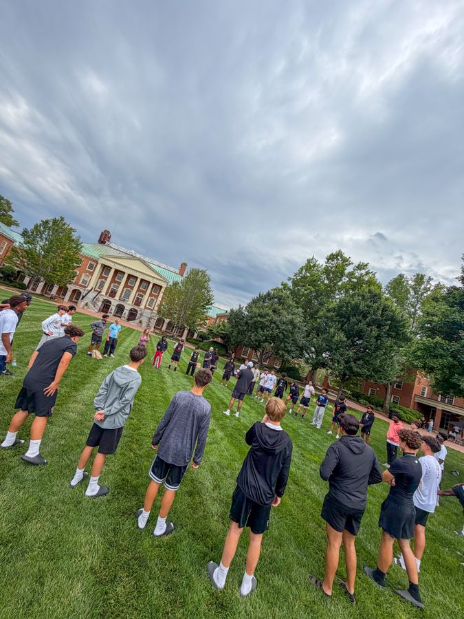 Team talk on the Wake Forest quad, 2026 College Bus + Camps TOUR